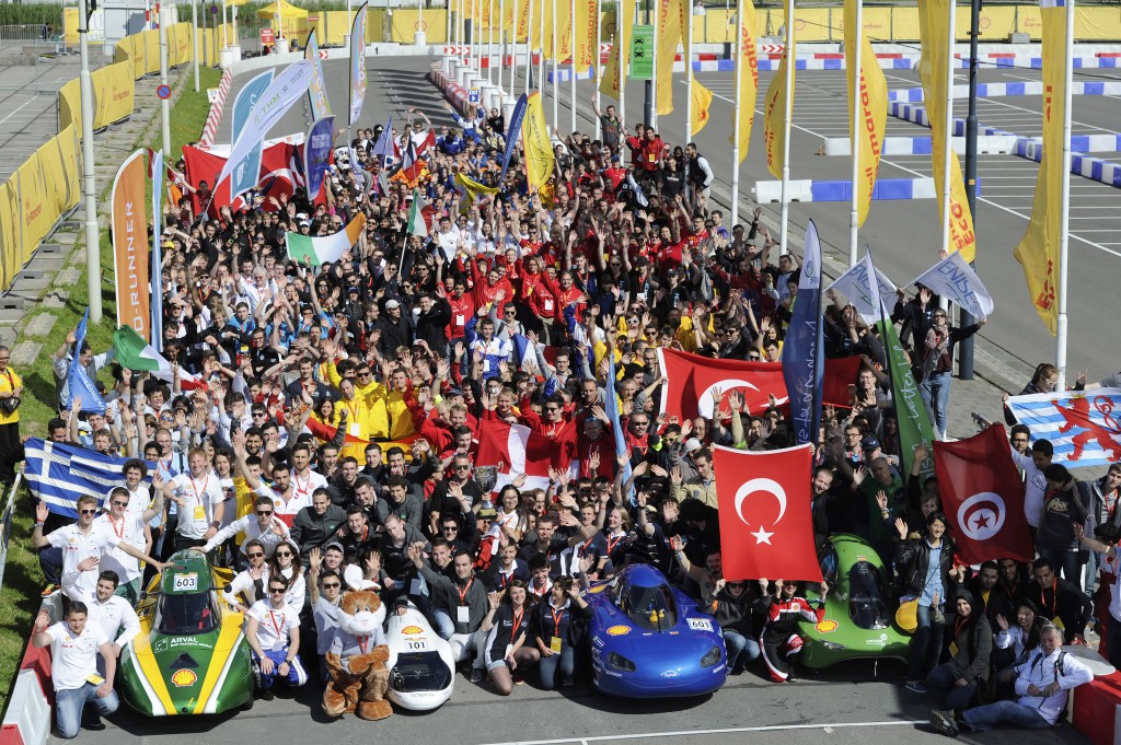 Participants line up for the group photo during practice day 2 of the Shell Eco-marathon Europe 2015 in Rotterdam, Netherlands, Thursday, May 21, 2015. (Patrick Post/AP Images for Shell)